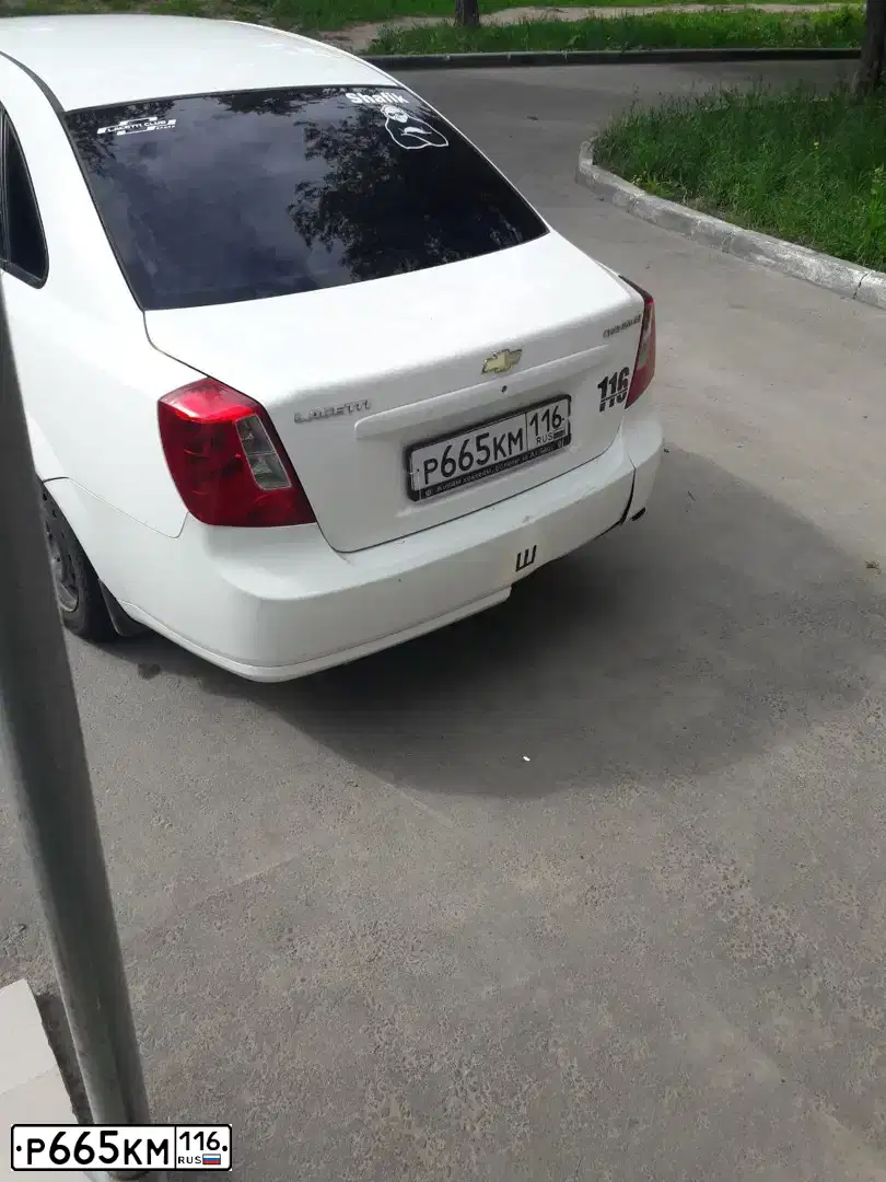 Фото автомобиля CHEVROLET LACETTI, 2012 — госномер К611МВ156. Цвет: БЕЛЫЙ