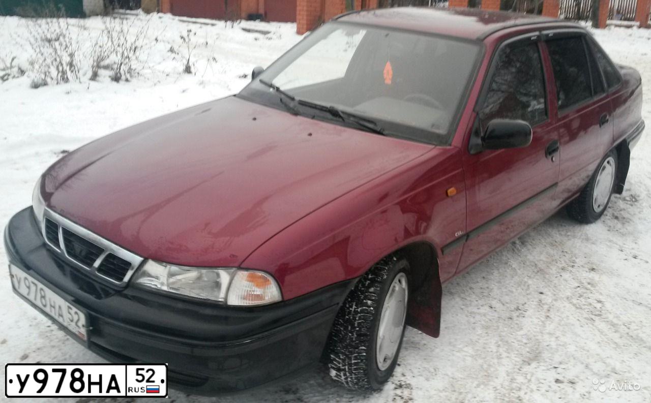Фото автомобиля DAEWOO NEXIA, 2008 — госномер Е441НМ62. Цвет: СПЕЛАЯ ВИШНЯ