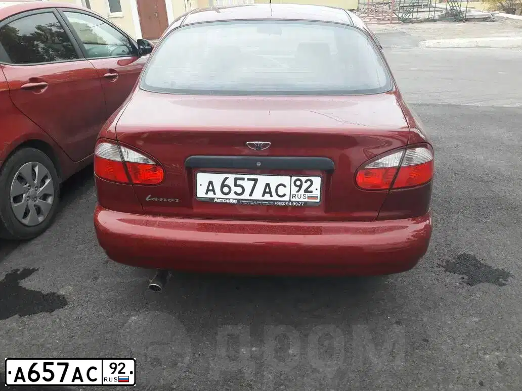 Фото автомобиля ДЭУ LANOS, 2006 — госномер М567УТ82. Цвет: ВИШНЕВЫЙ
