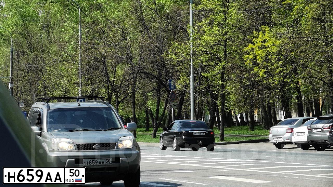 Фото автомобиля LADA 2109 SAMARA, 1991 — госномер Н659АА50. Цвет: Красный