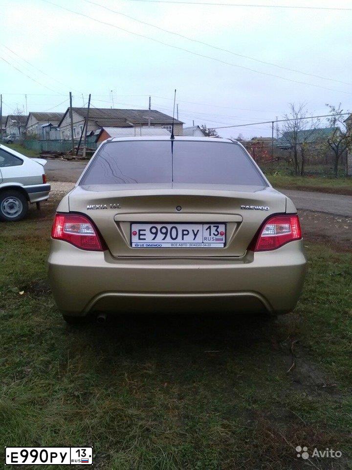 Фото автомобиля DAEWOO O NEXIA, 2011 — госномер Е990РУ13. Цвет: ПЕСОЧНЫЙ