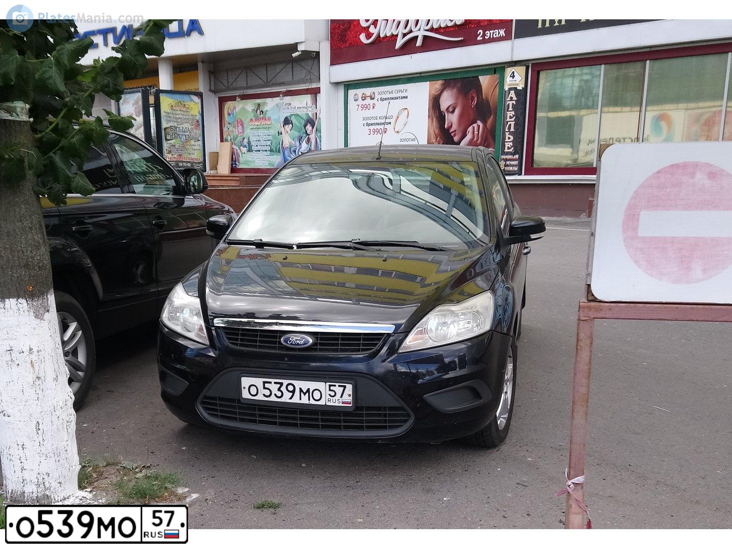 Фото автомобиля FORD FOCUS, 2009 — госномер Р232ЕК32. Цвет: ЧЕРНЫЙ