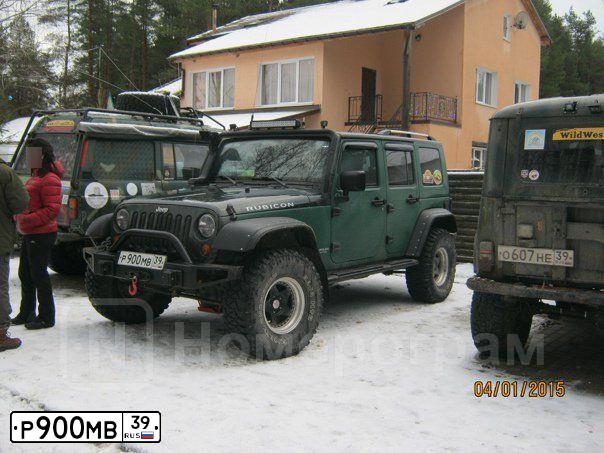 Фото автомобиля JEEP WRANGLER, 2010 — госномер Р356УК39. Цвет: ТЕМНО-ЗЕЛЕНЫЙ