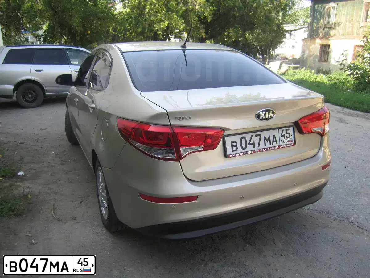 Фото автомобиля KIA RIO, 2015 — госномер Т650СЕ72. Цвет: БЕЖЕВЫЙ