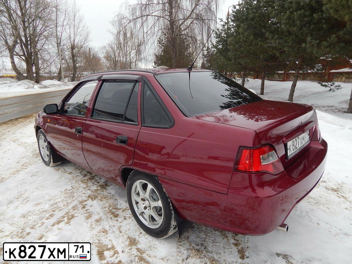 Фото автомобиля DAEWOO NEXIA, 2010 — госномер Т511ОХ71. Цвет: СПЕЛАЯ ВИШНЯ