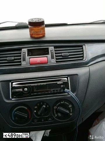 Фото автомобиля MITSUBISHI LANCER, 2005 — госномер В004МЕ197. Цвет: Красный