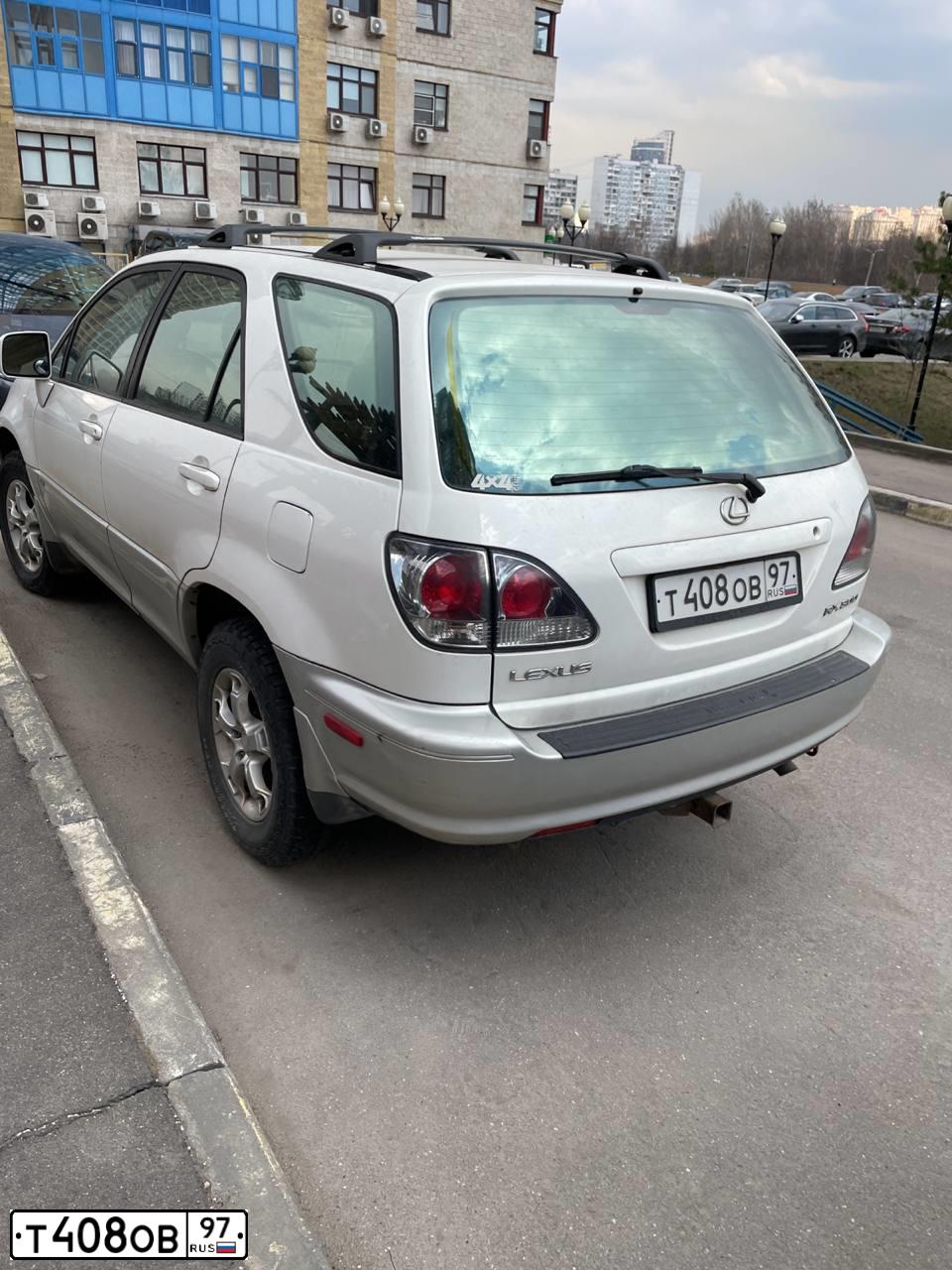Фото автомобиля LEXUS RX, 2001 — госномер Т408ОВ97. Цвет: БЕЛЫЙ