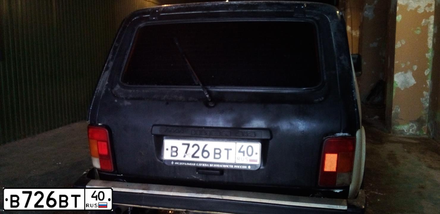 Фото автомобиля LADA 2121 NIVA, 1997 — госномер С787НТ67. Цвет: ЧЕРНЫЙ БЕЛЫЙ