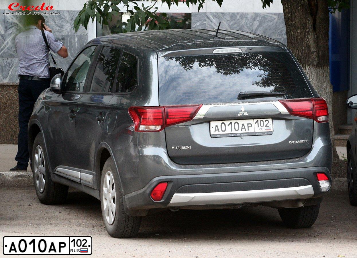 Фото автомобиля MITSUBISHI OUTLANDER, 2018 — госномер Е977НМ716. Цвет: Белый