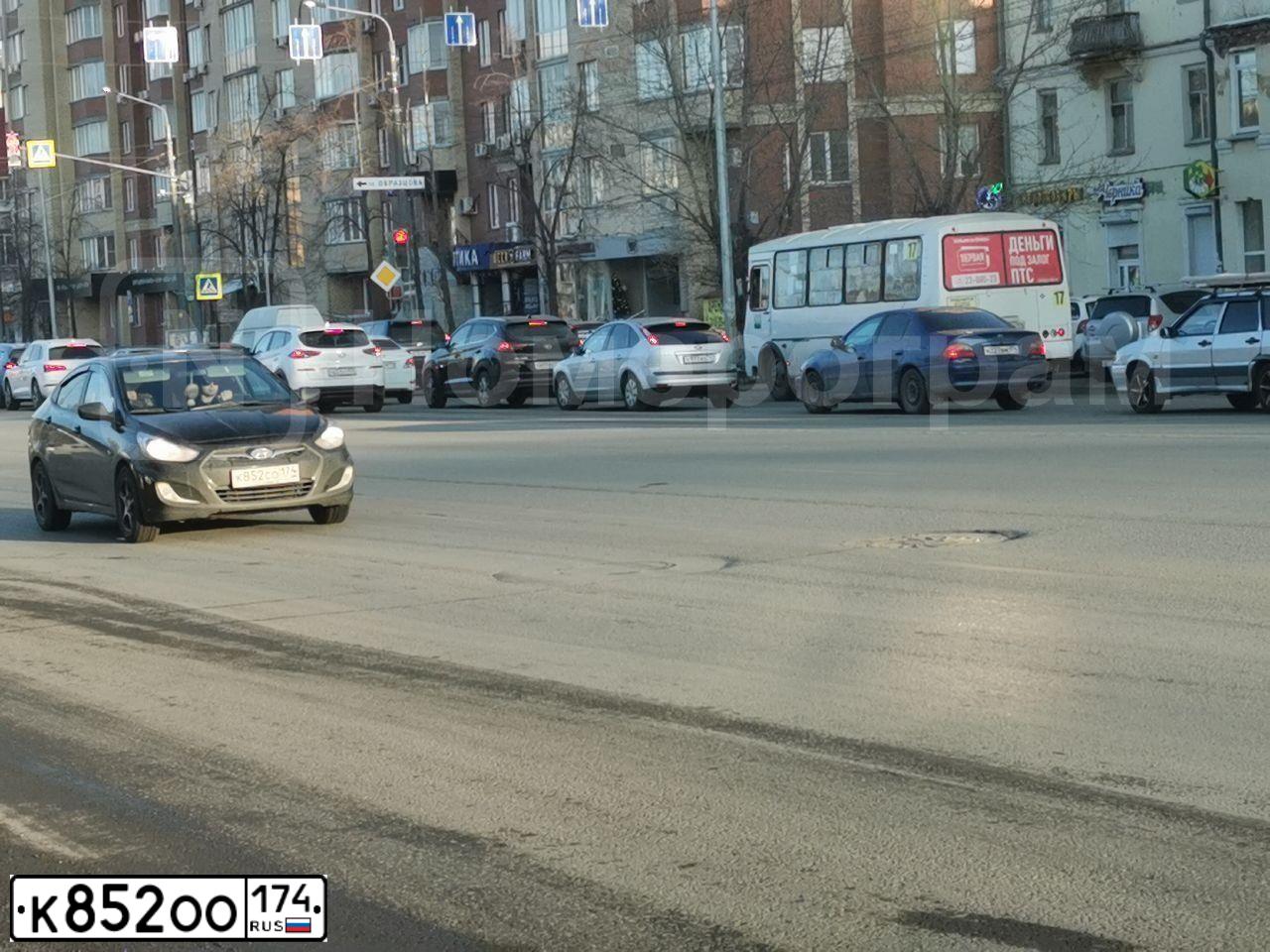 Фото автомобиля FORD FOCUS, 2012 — госномер А061СТ174. Цвет: СИНИЙ