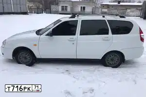 Фото автомобиля LADA 2171 PRIORA, 2009 — госномер В001НН71. Цвет: Белый