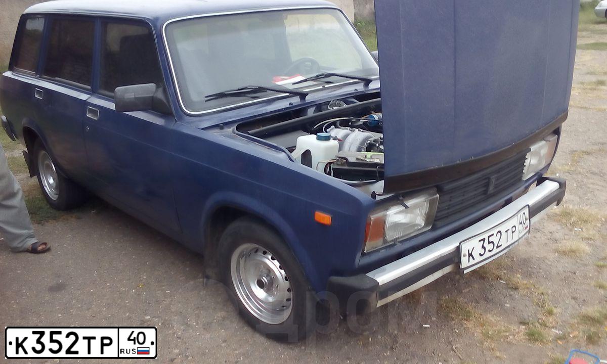 Фото автомобиля LADA 2104, 2005 — госномер К352ТР40. Цвет: ТЕМНО-СИНИЙ