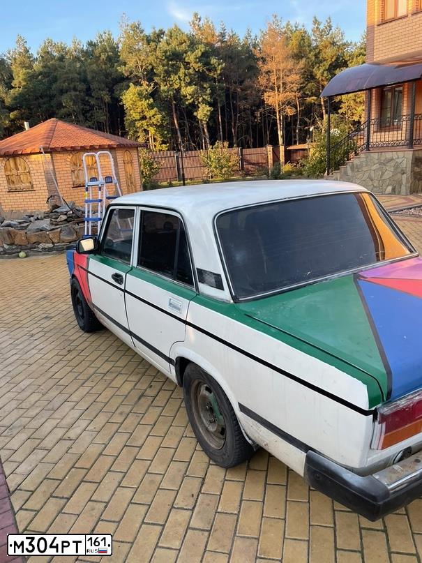 Фото автомобиля LADA 2107, 2006 — госномер Н052УА61. Цвет: ЯРКО-БЕЛЫЙ