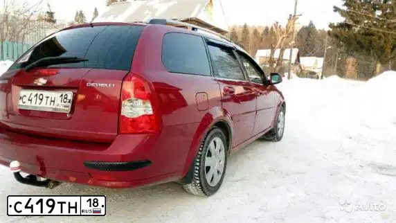 Фото автомобиля CHEVROLET LACETTI, 2010 — госномер С419ТН18. Цвет: Красный