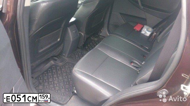 Фото автомобиля GEELY EMGRAND X7, 2014 — госномер Е051СМ159. Цвет: ТЕМНО-ВИШНЕВЫЙ