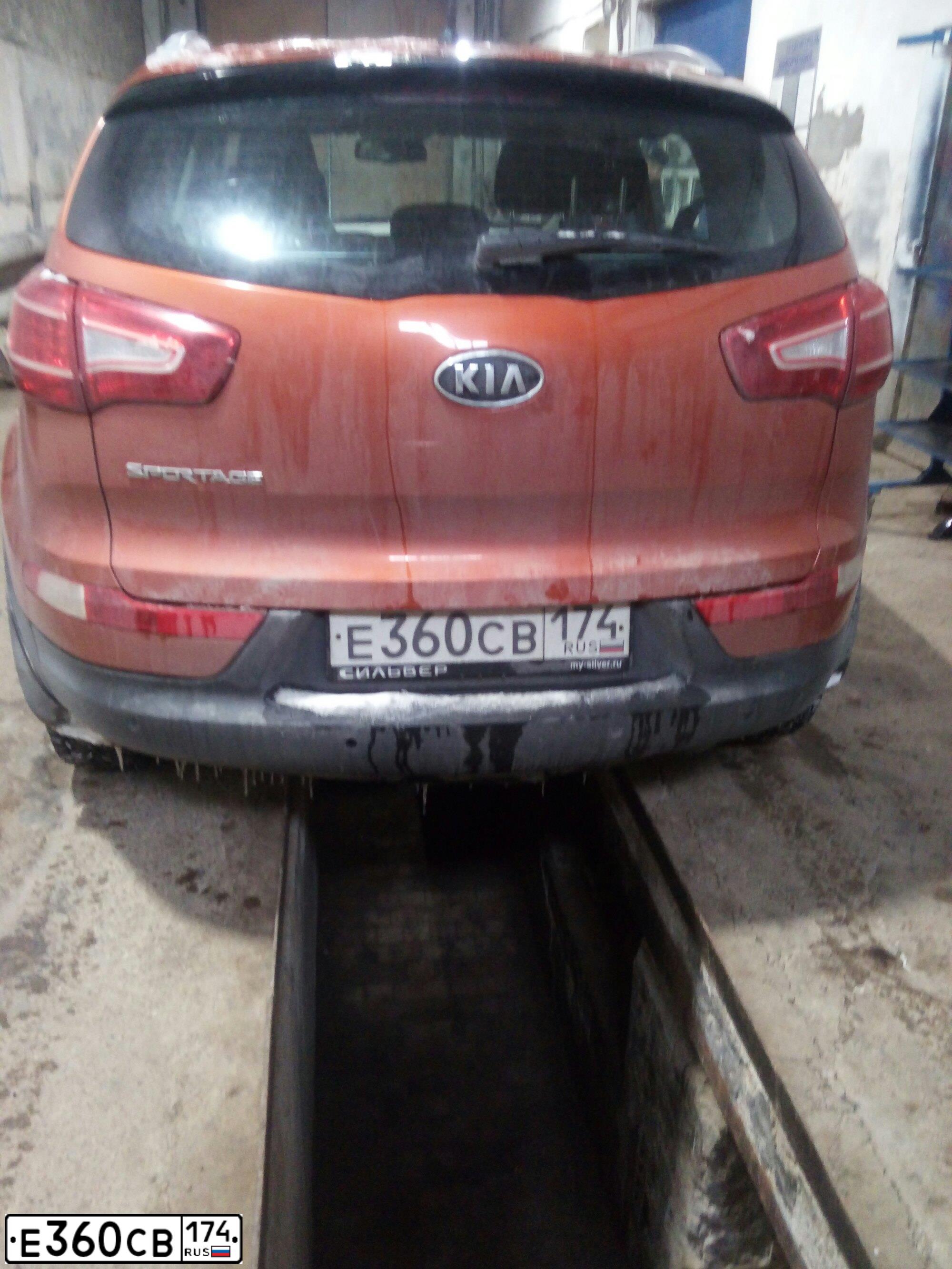 Фото автомобиля KIA SPORTAGE, 2012 — госномер Е360СВ174. Цвет: ОРАНЖЕВЫЙ