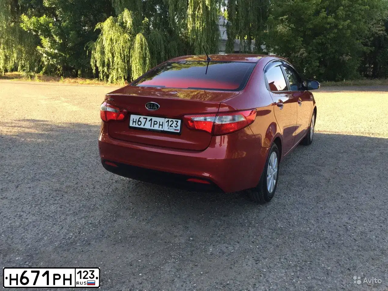 Фото автомобиля KIA RIO, 2012 — госномер В199ВС92. Цвет: Красный