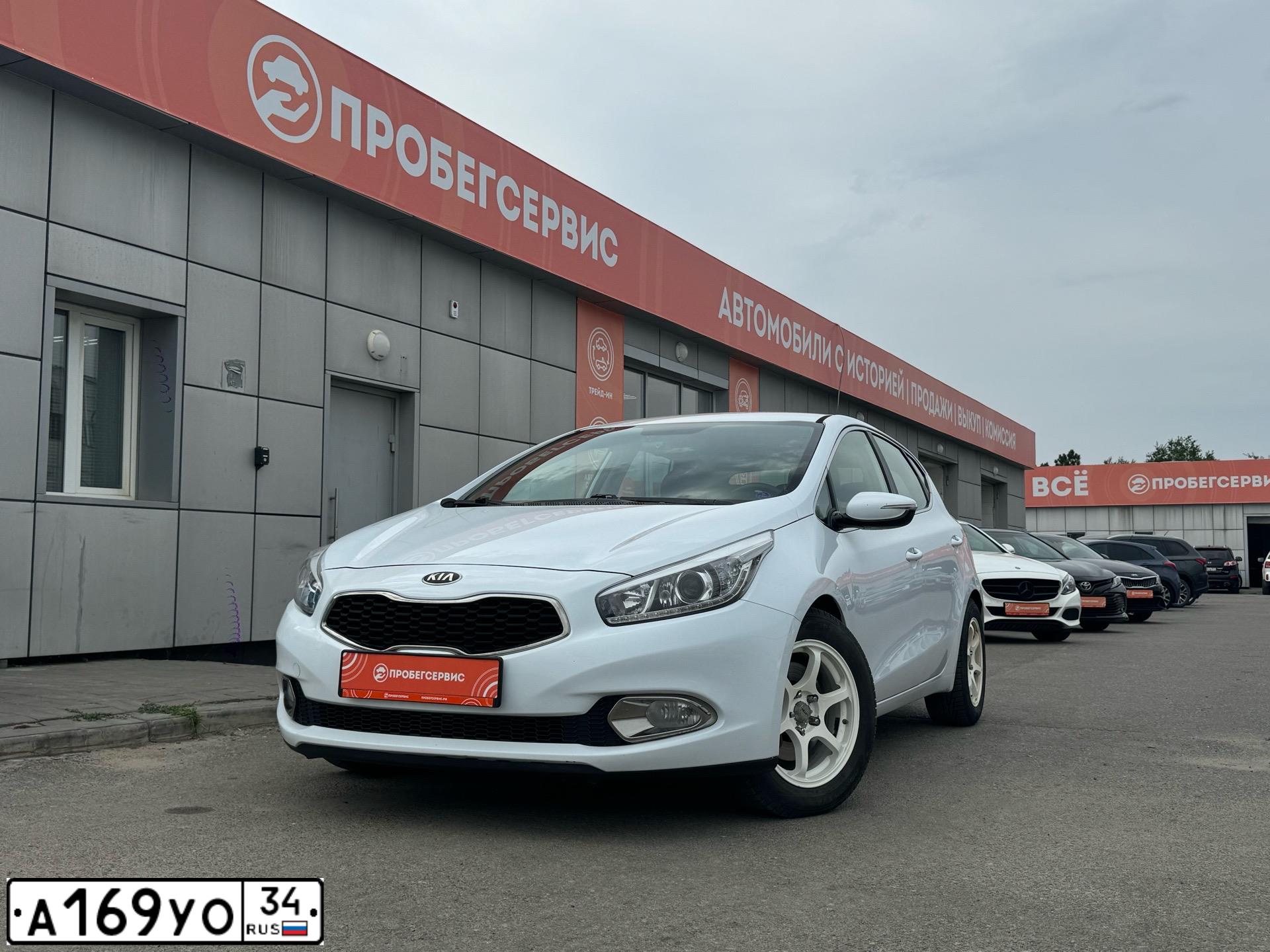 Фото автомобиля KIA CEE'D, 2013 — госномер А169УО34. Цвет: БЕЛЫЙ