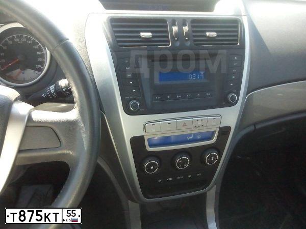 Фото автомобиля GEELY EMGRAND X7, 2015 — госномер Т785СТ55. Цвет: ЧЕРНЫЙ
