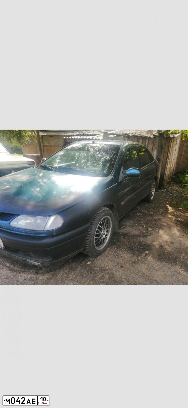 Фото автомобиля RENAULT LAGUNA, 1995 — госномер М042АЕ10. Цвет: ЗЕЛЕНЫЙ