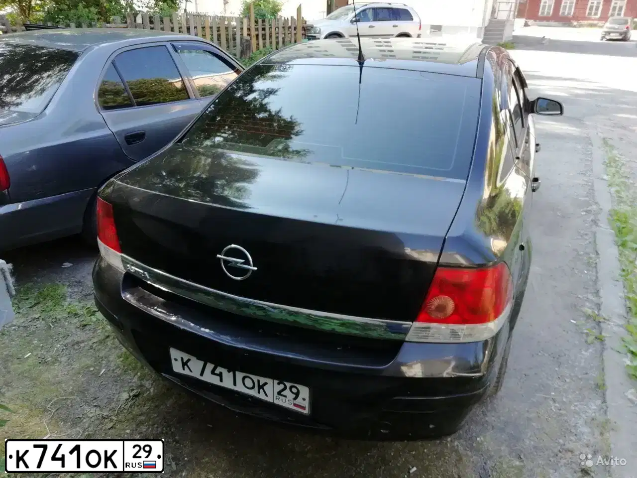 Фото автомобиля OPEL ASTRA, 2008 — госномер К121ОО35. Цвет: ЧЕРНЫЙ
