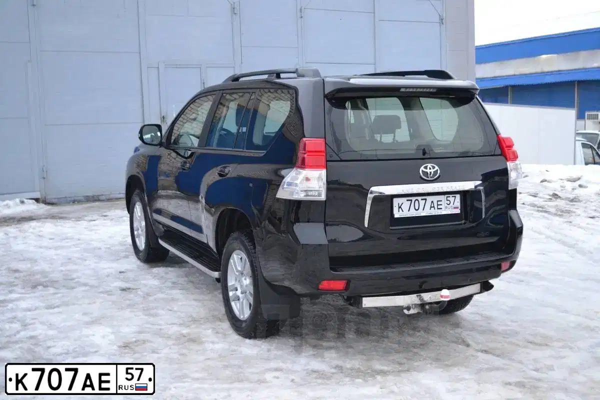 Фото автомобиля TOYOTA LAND CRUISER 150 (PRADO), 2012 — госномер Х063ЕУ18. Цвет: ЧЕРНЫЙ