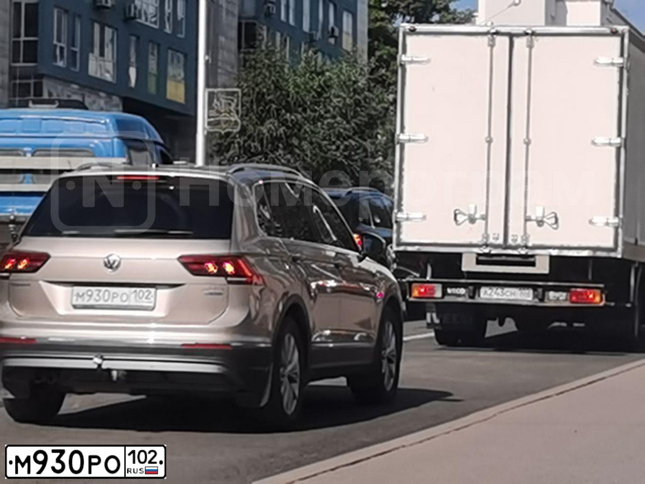 Фото автомобиля VOLKSWAGEN TIGUAN, 2012 — госномер Е997УЕ102. Цвет: ЧЕРНЫЙ