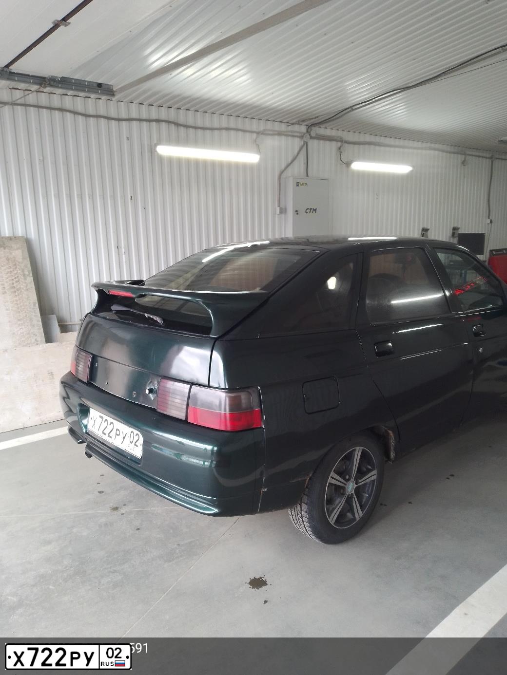 Фото автомобиля LADA 2112, 2003 — госномер Х722РУ02. Цвет: Темно-зеленый