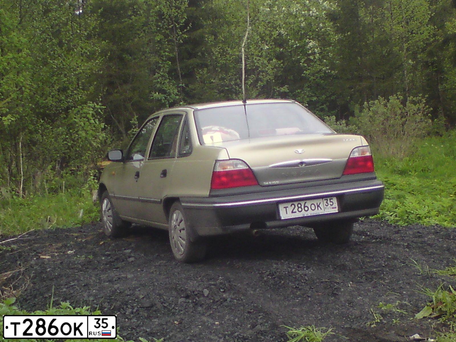 Фото автомобиля DAEWOO NEXIA, 2007 — госномер М034ЕМ35. Цвет: ЖЕЛТЫЙ ПЕСОЧНЫЙ
