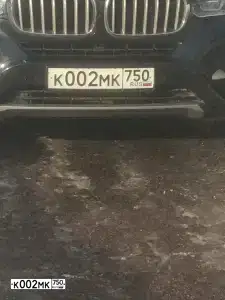 Фото автомобиля BMW X6, 2015 — госномер К002МК750. Цвет: ЧЕРНЫЙ