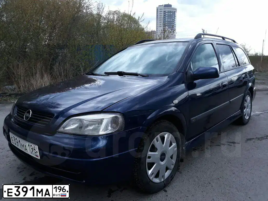 Фото автомобиля OPEL ASTRA, 1999 — госномер Е391МА196. Цвет: СИНИЙ