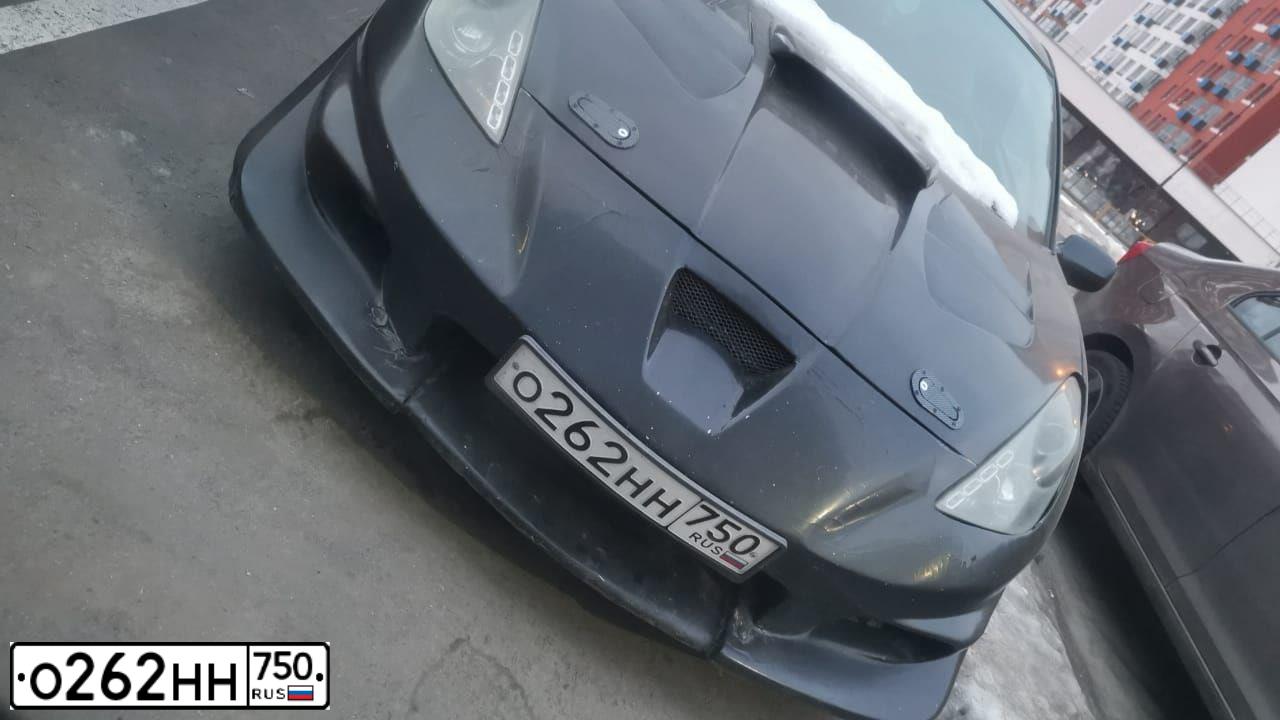 Фото автомобиля TOYOTA CELICA, 2003 — госномер М003НС32. Цвет: ЧЕРНО-СИНИЙ
