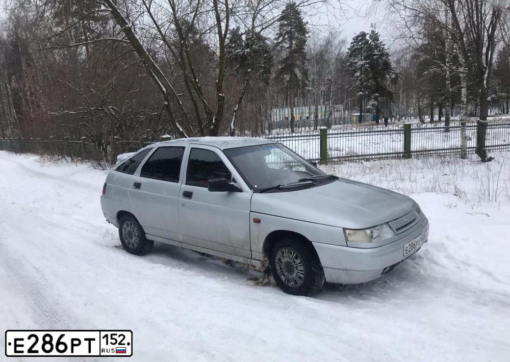 Фото автомобиля LADA 2112, 2006 — госномер Н212СТ33. Цвет: Серебристый