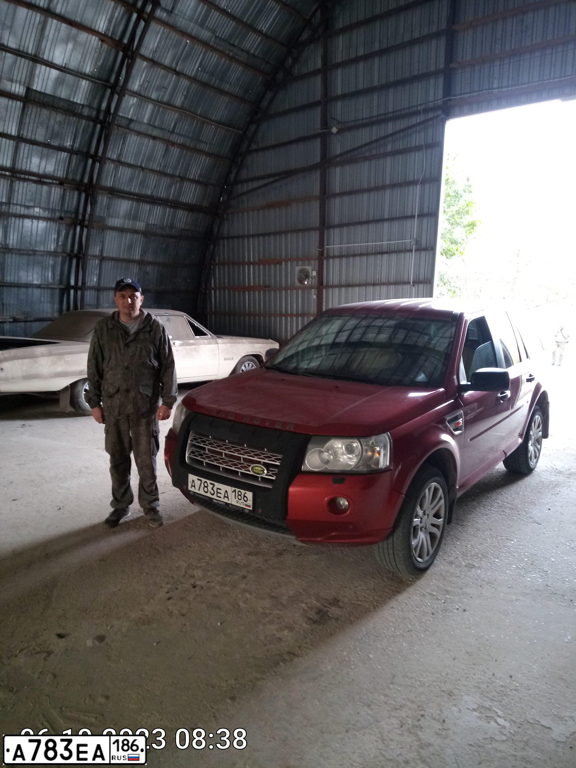 Фото автомобиля LAND ROVER FREELANDER, 2008 — госномер Н281МА82. Цвет: ТЕМНО-КРАСНЫЙ