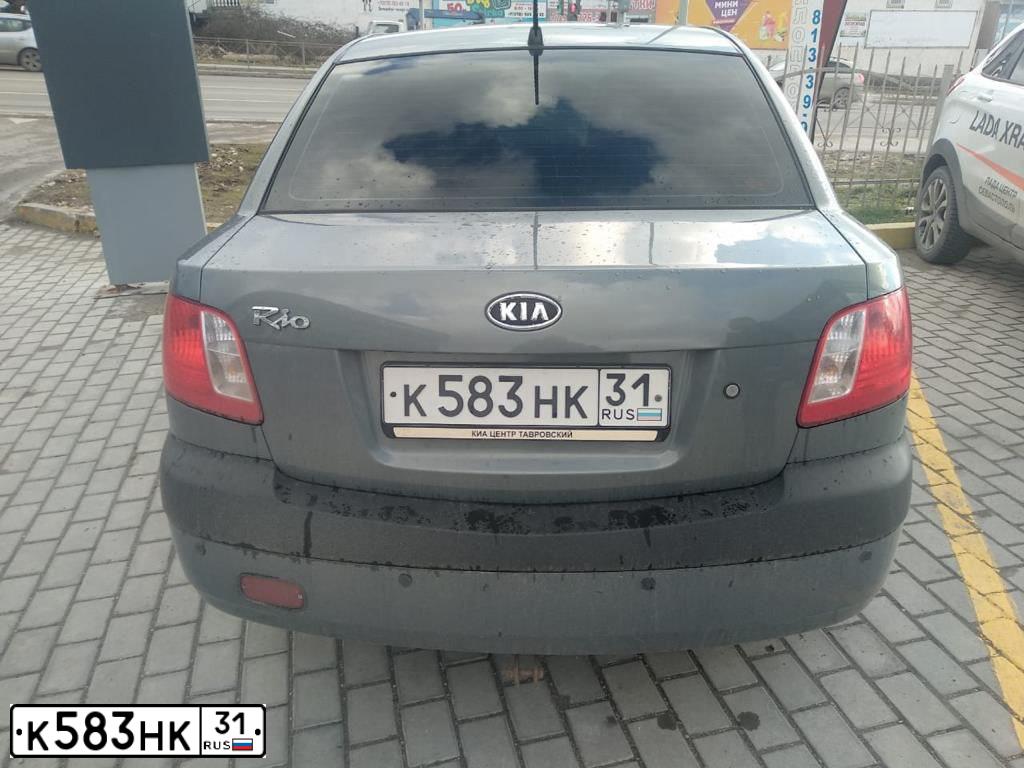Фото автомобиля KIA RIO, 2007 — госномер К583НК31. Цвет: ОЛИВКОВО-СЕРЫЙ