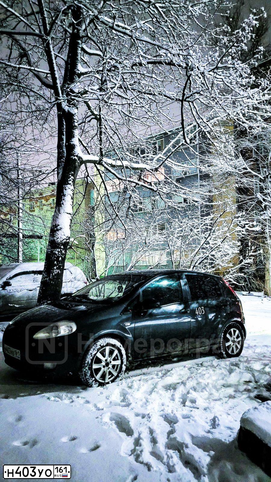 Фото автомобиля FIAT PUNTO, 2007 — госномер Н403УО161. Цвет: белый(серый)