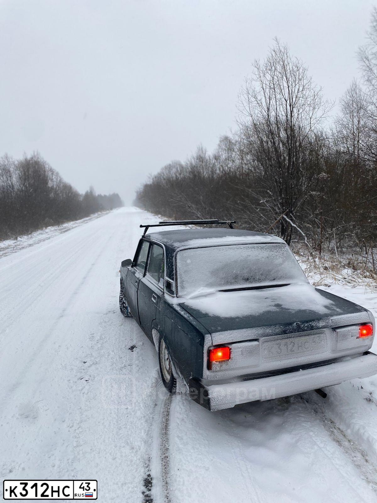 Фото автомобиля LADA 2107, 2005 — госномер К312НС43. Цвет: ТЕМНО-ЗЕЛЕНЫЙ
