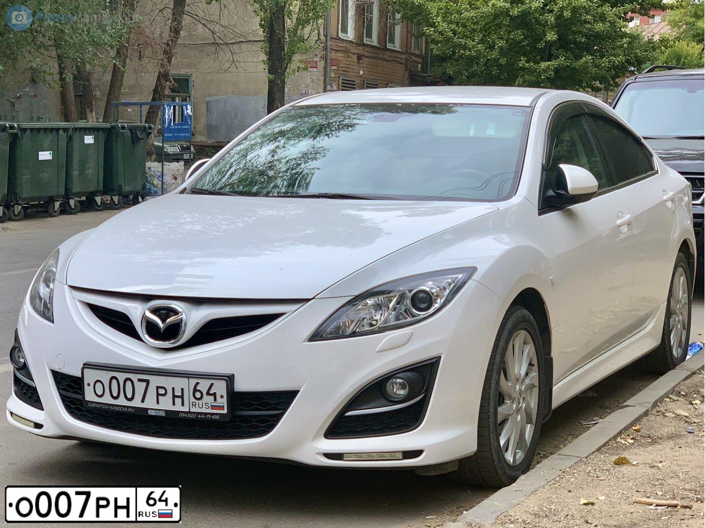 Фото автомобиля MAZDA 3, 2007 — госномер Т025НЕ58. Цвет: ЧЕРНЫЙ