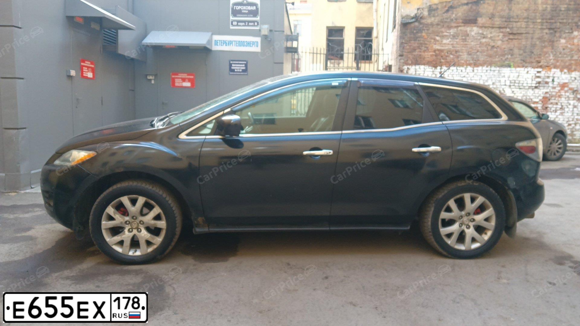 Фото автомобиля MAZDA CX-7, 2006 — госномер В747УМ147. Цвет: ЧЕРНЫЙ