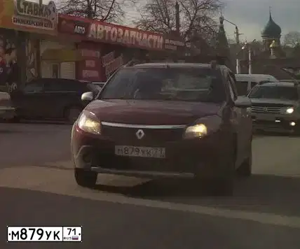 Фото автомобиля RENAULT SANDERO, 2012 — госномер Т354ОС71. Цвет: Красный
