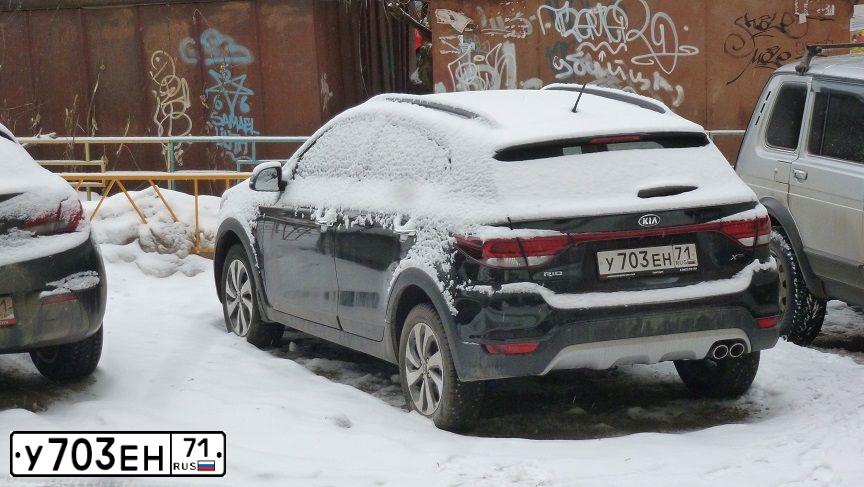 Фото автомобиля KIA RIO, 2020 — госномер У703ЕН71. Цвет: ЧЕРНЫЙ