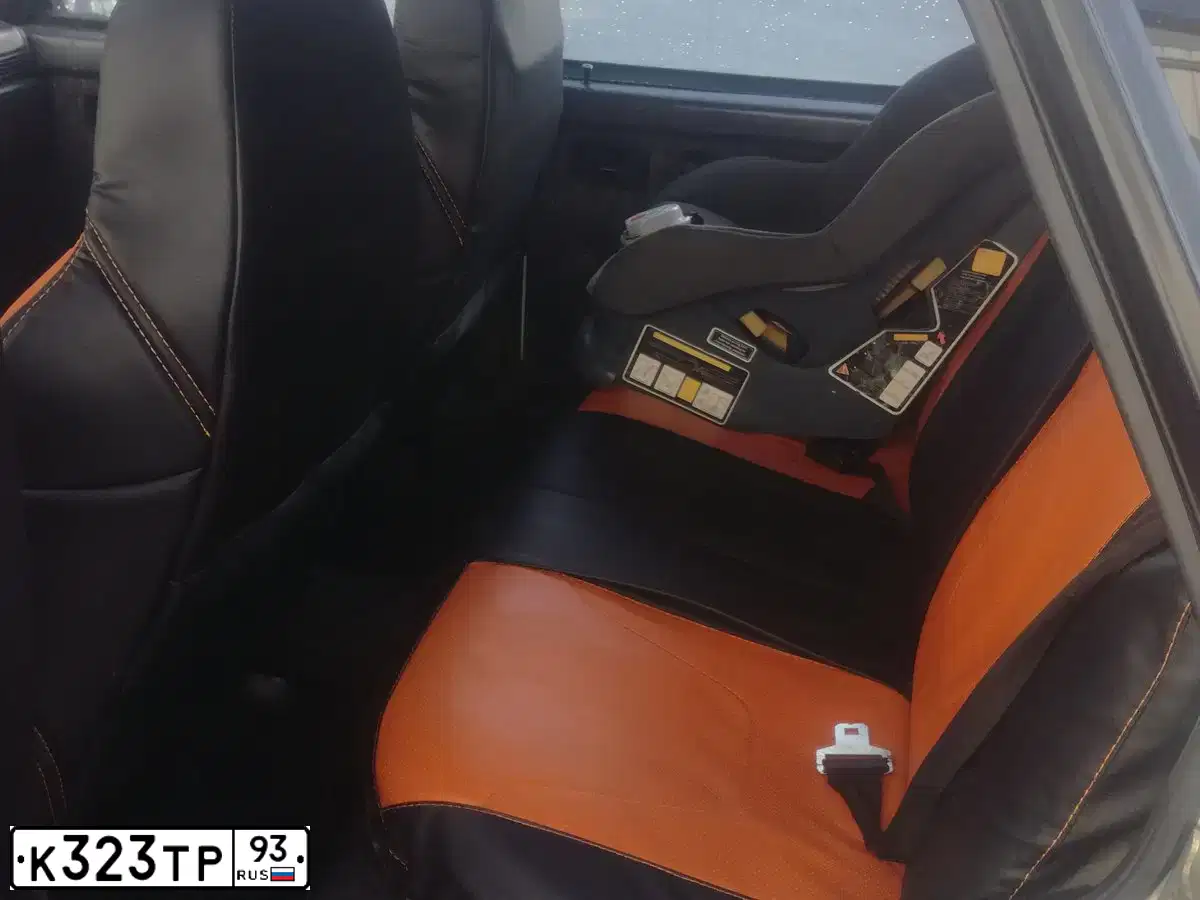 Фото автомобиля MAZDA 323, 1994 — госномер Т323АН23. Цвет: КРАСНЫЙ