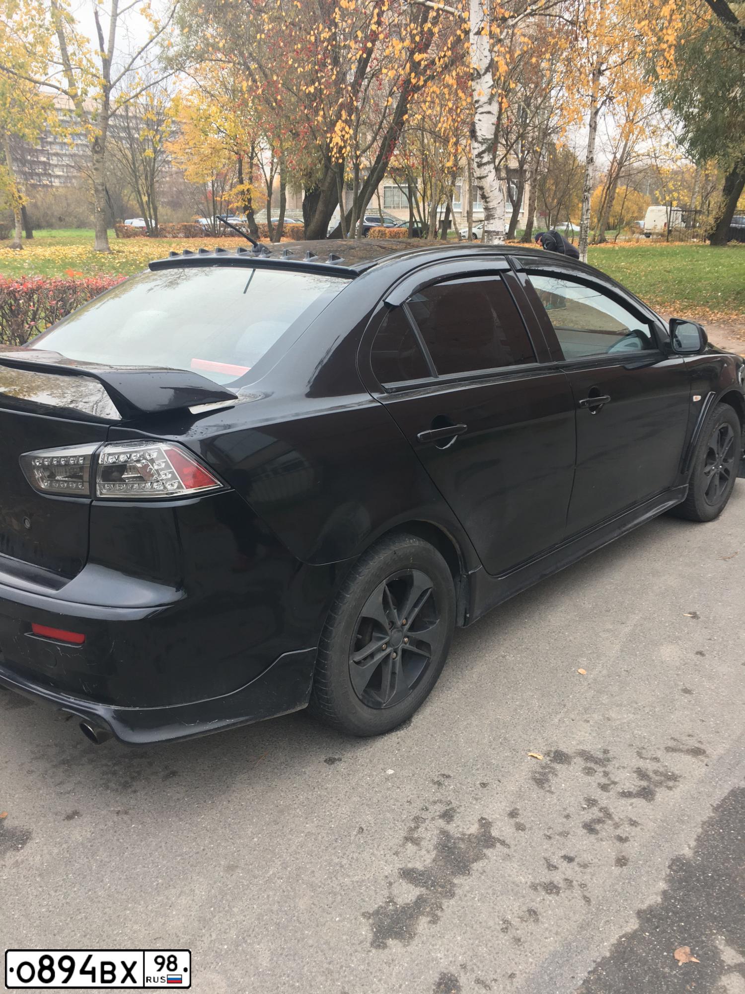 Фото автомобиля MITSUBISHI LANCER, 2008 — госномер Н975ТХ797. Цвет: ЧЕРНЫЙ