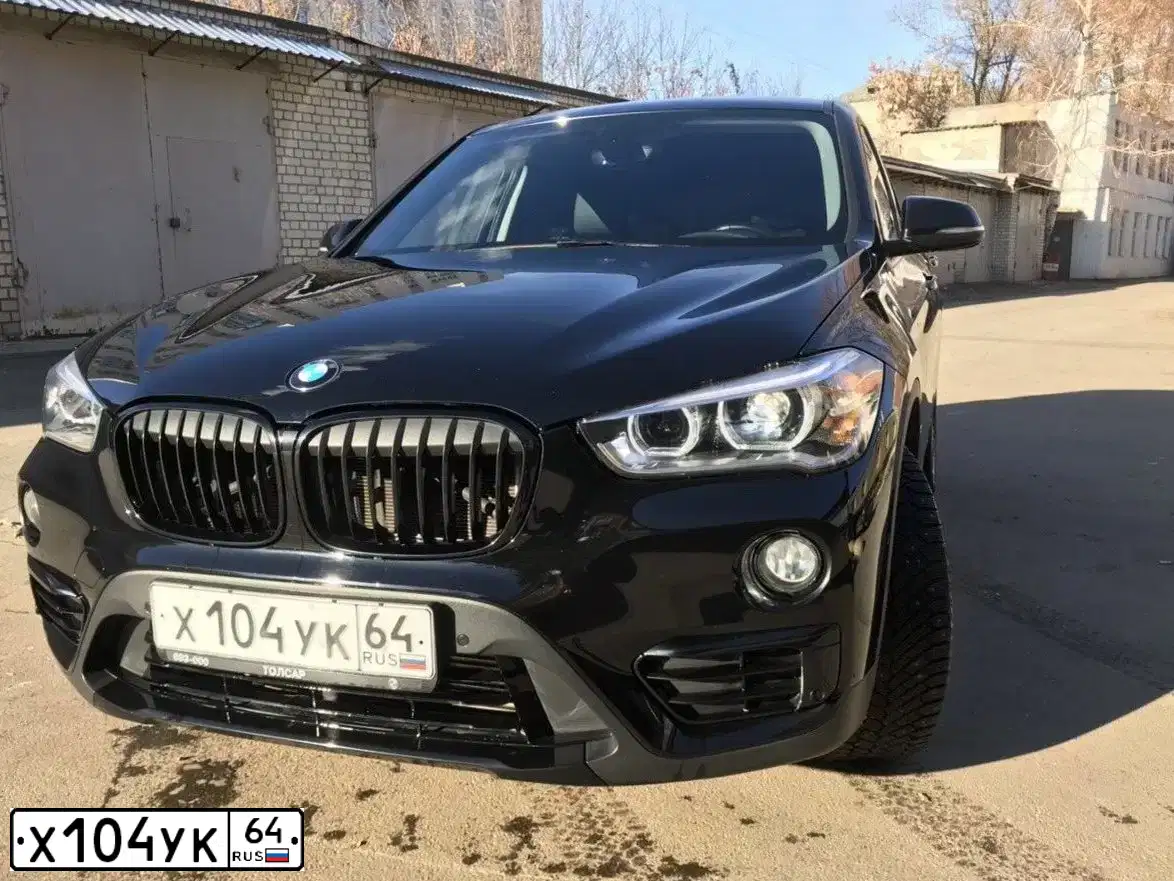 Фото автомобиля MITSUBISHI OUTLANDER, 2011 — госномер Х104УК64. Цвет: Серебристый