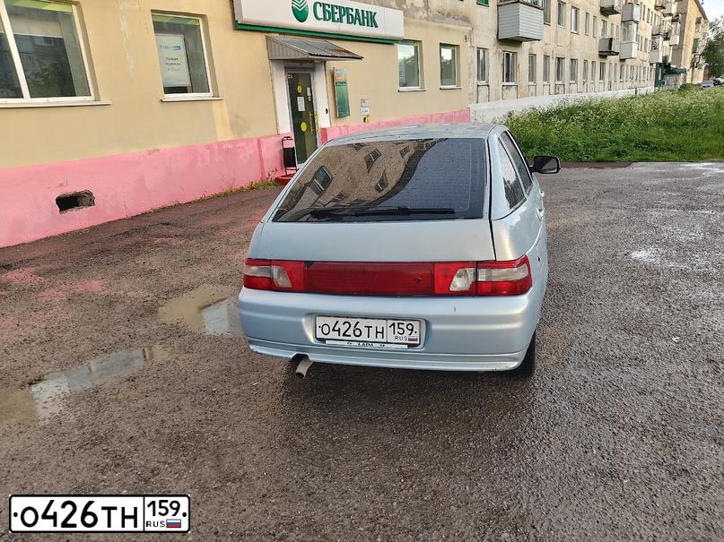Фото автомобиля LADA 2112 LADA, 2004 — госномер Н835НН159. Цвет: Серебристо-Желтый