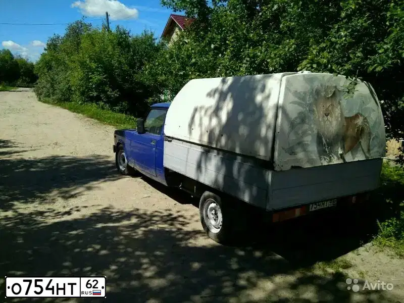 Фото автомобиля LADA 2345 WIS, 2000 — госномер В681МУ09. Цвет: ТЕМНО-ГОЛУБОЙ