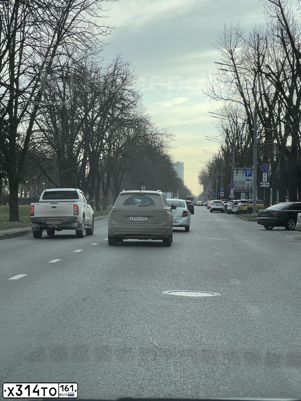 Фото автомобиля VOLKSWAGEN TIGUAN, 2018 — госномер Х314ТО161. Цвет: Серебристый