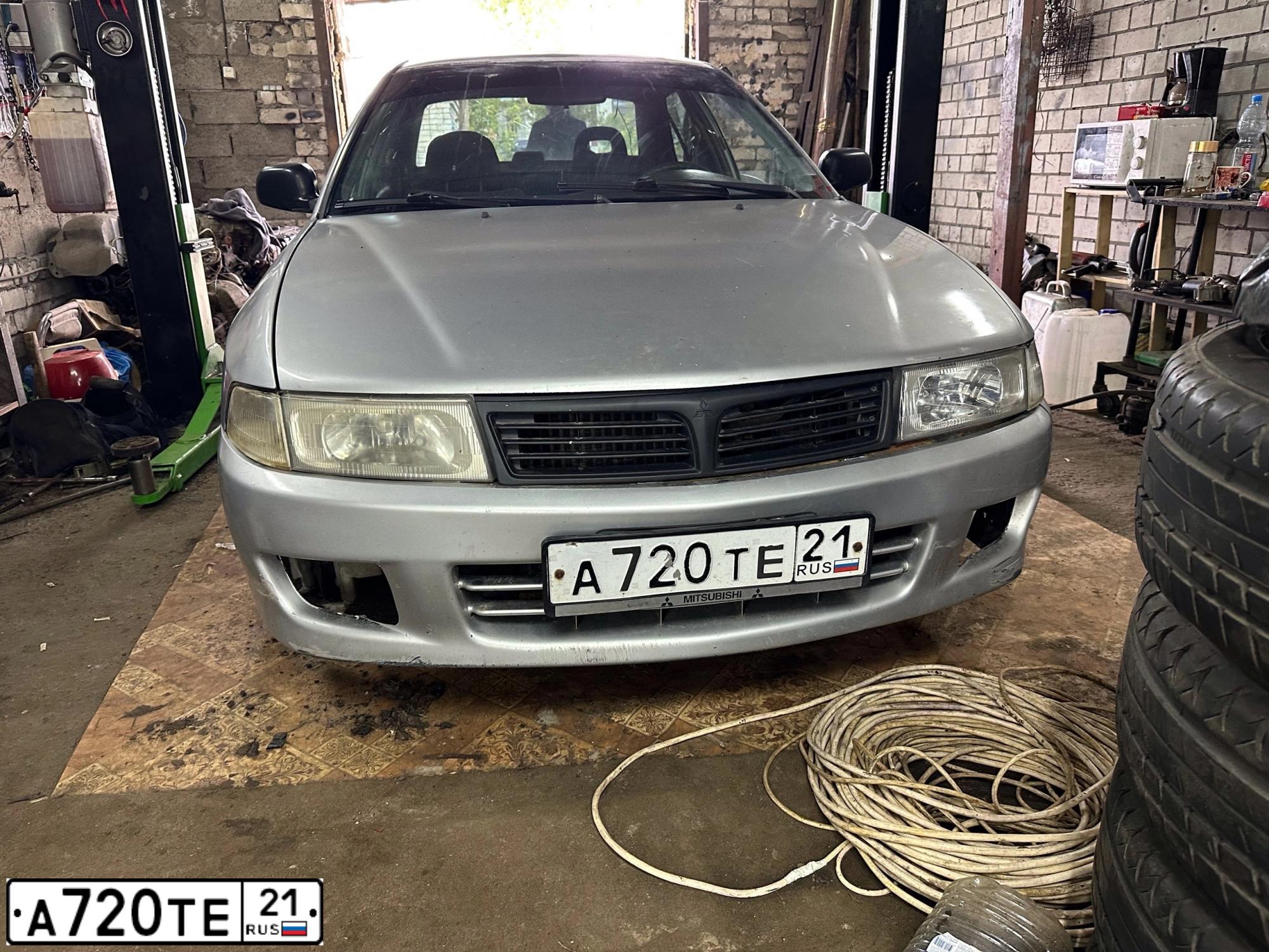 Фото автомобиля MITSUBISHI LANCER, 1999 — госномер А720ТЕ21. Цвет: Серебристый