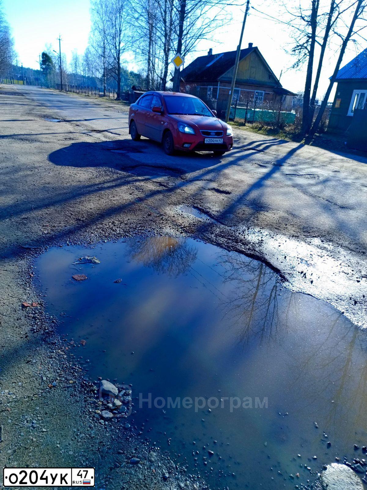 Фото автомобиля KIA RIO, 2011 — госномер О204УК47. Цвет: Красный
