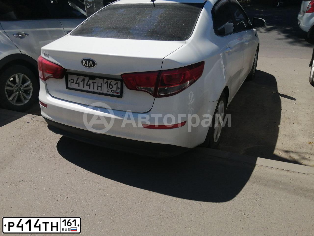 Фото автомобиля KIA RIO, 2015 — госномер Р414ТН161. Цвет: Белый